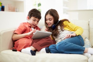 image of kids on sofa for Sydney residential upholstery cleaning service from carpet cleaning authority
